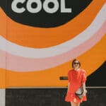 grace van cleave in front of "kind is cool" sign